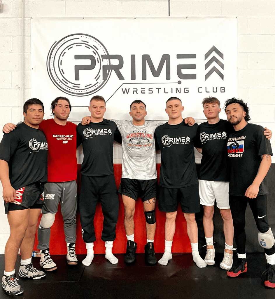prime wrestling club coaches and team memebers.